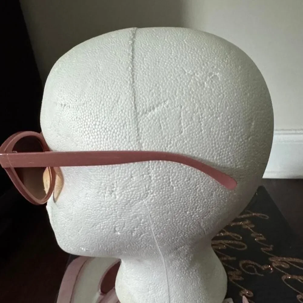 Pink sunglasses with brown lenses